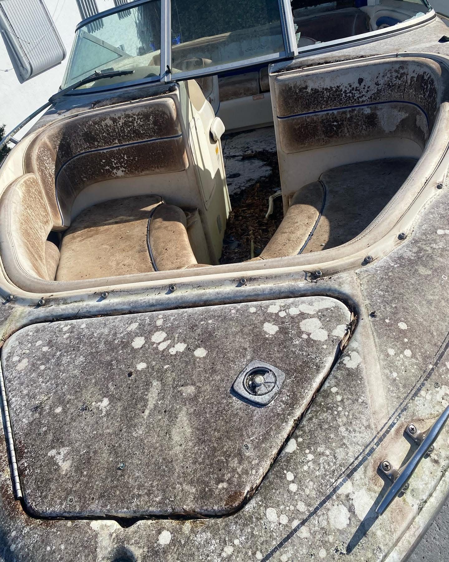 Before-and-after dirty boat interior cleaning in Lake Villa IL by Captain Coles Detailing, mobile boat detailing specialists.