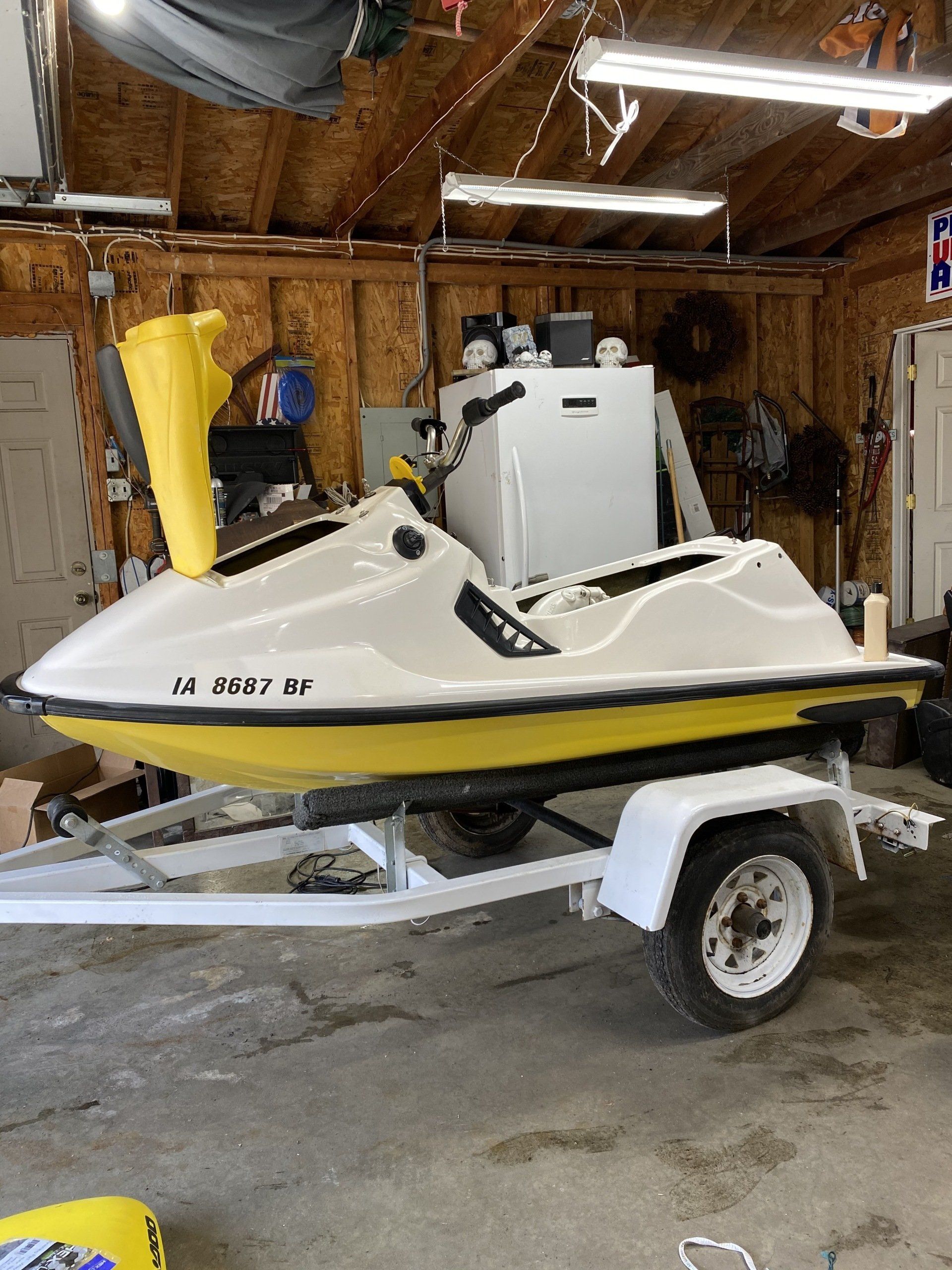 Jet ski hull polishing and fiberglass enhancement in Lake Villa IL by Captain Coles Detailing.