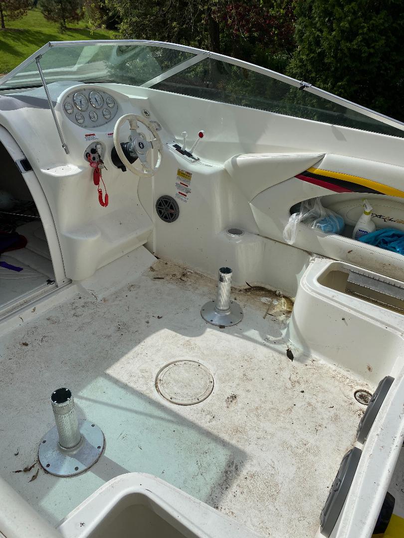 Boat floor cleaning before service — mobile detailing in Antioch IL by Captain Coles Detailing.