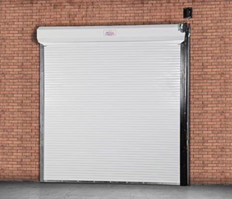 Garage Door and Brick Wall — Morristown, TN — Lakeway Door & Glass Inc.