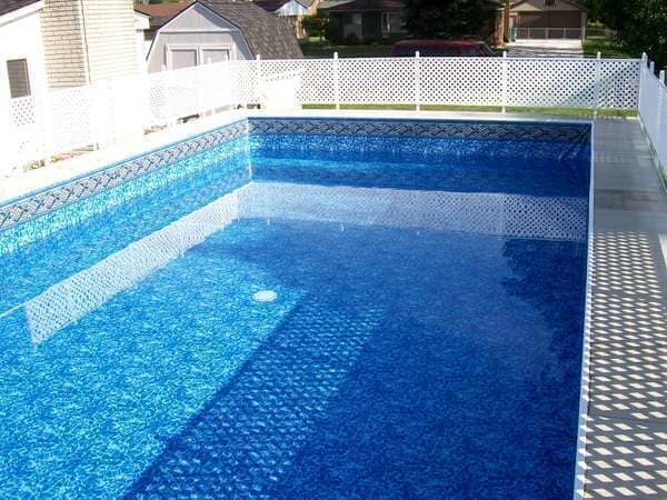 Swimming Pool With White Fence — Clinton Township, MI — Bob Clement Pool Service LLC