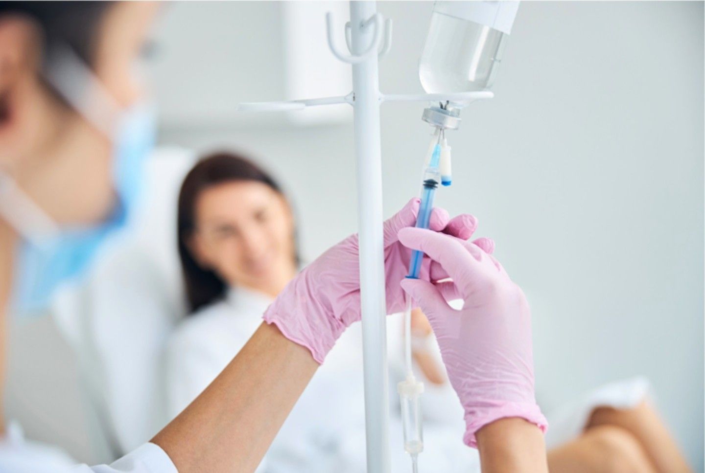 closeup of woman receiving IV infusion
