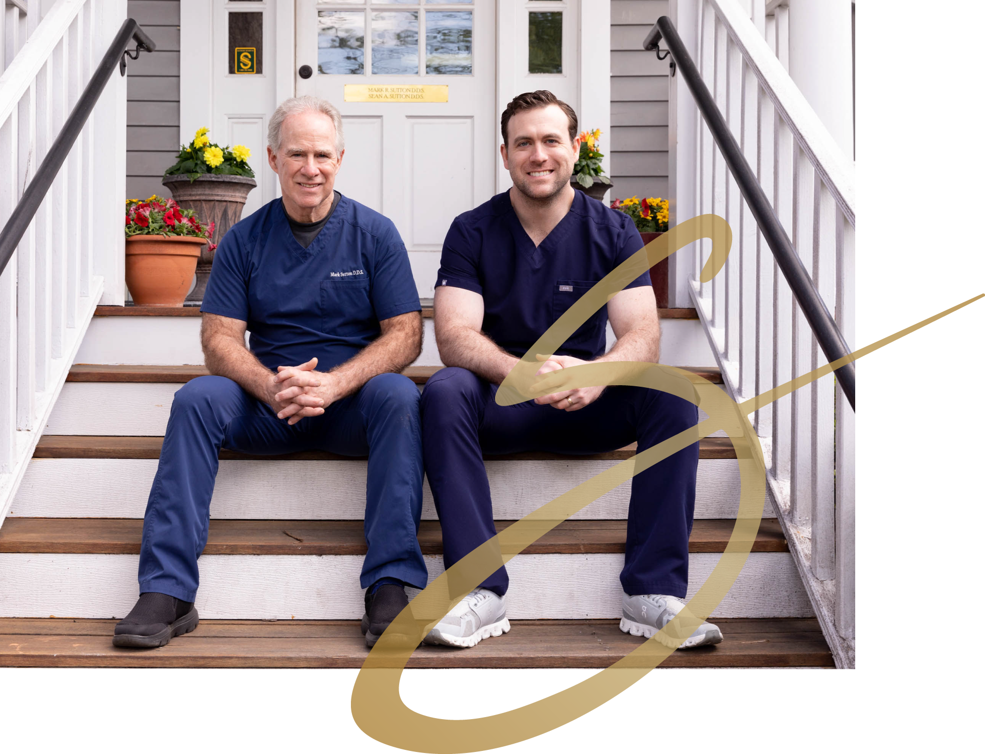 Two men are posing for a picture in front of a building