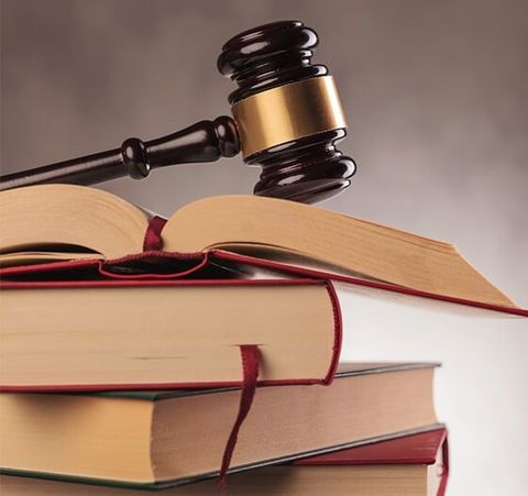 Law books and gavel - Legal Service in Saint Johns, MI
