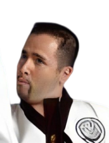 A man wearing a white karate uniform with a black belt