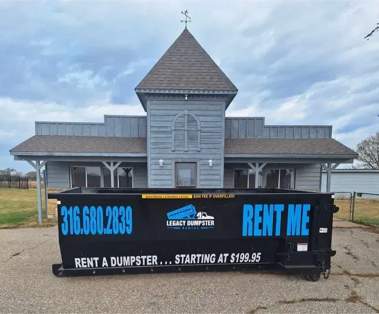 A large black dumpster for the best dumpster rental.