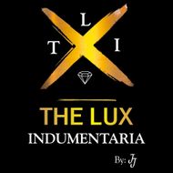 Un logotipo para Lux Indumentaria con un diamante en el medio.