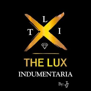 Un logotipo para Lux Indumentaria con un diamante en el medio.