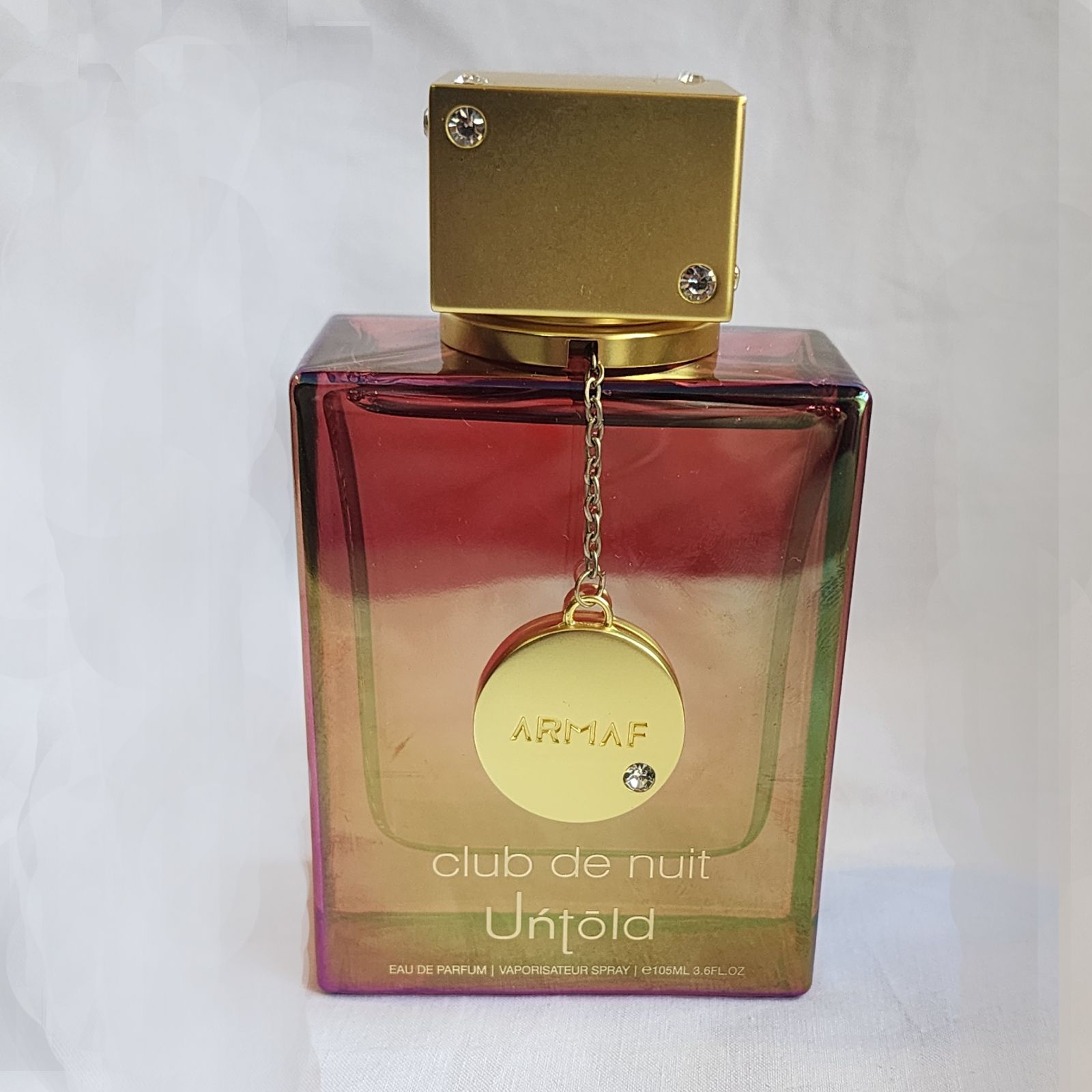 Una botella de perfume Armaf Club de Nuit Unfold