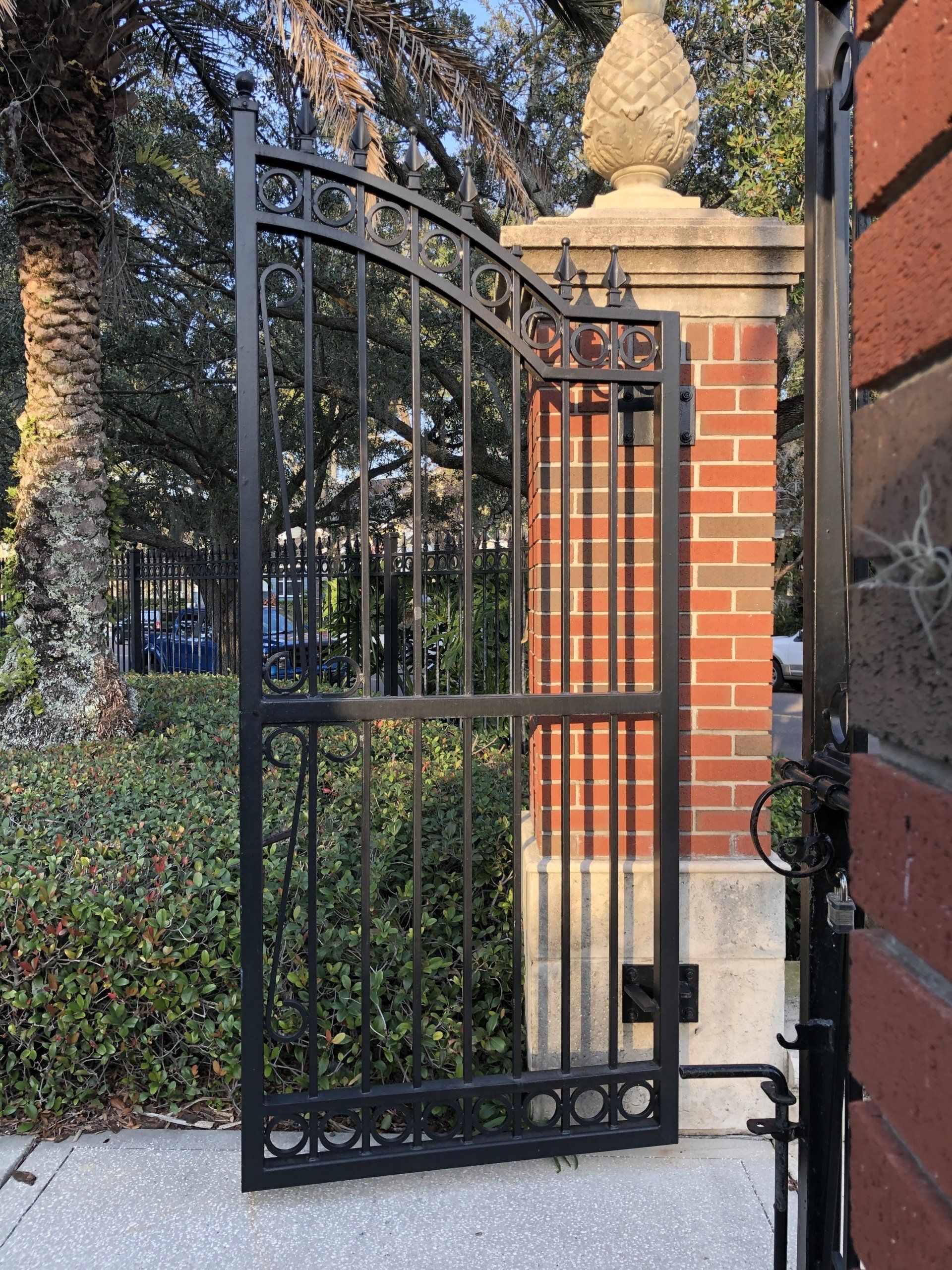 side gate in open position at a public playground