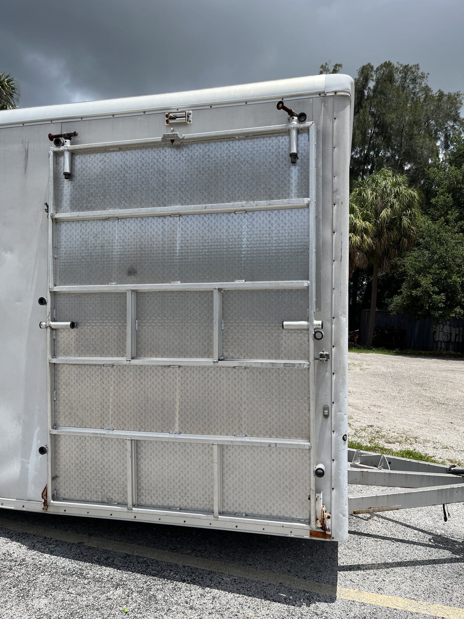 custom trailer folding door Tampa hauling