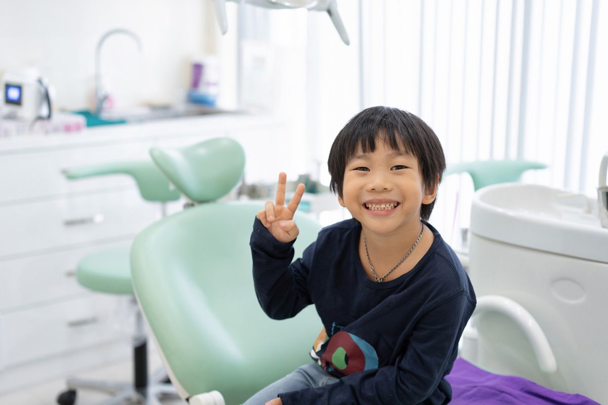 Boy Feel Happy to Sit on the Dental Chair — Pinetop, AZ — Blue Ridge Family Dentistry PC