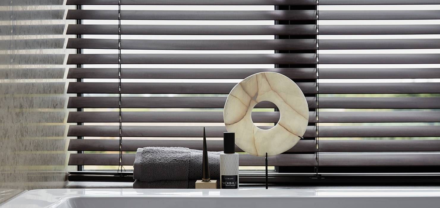 Stylish Aluminium Blinds in a modern living space, combining functional shading with a premium interior design aesthetic.