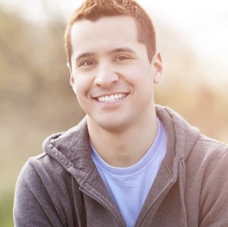 Photo of guy with invisalign