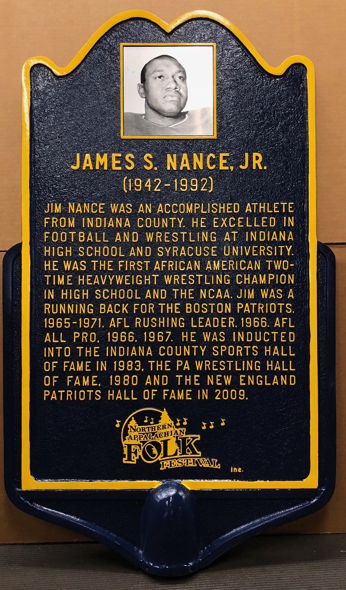 A plaque with a picture of james s. hance jr. on it