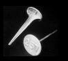 A close up of a pair of earrings on a black background.