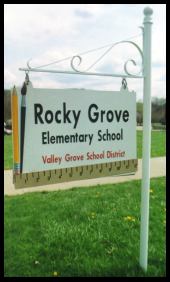 A sign for rocky grove elementary school in valley grove school district