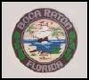 A seal of the state of florida with a shark in the water.
