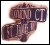 A street sign for raymond ct and st. james rd.