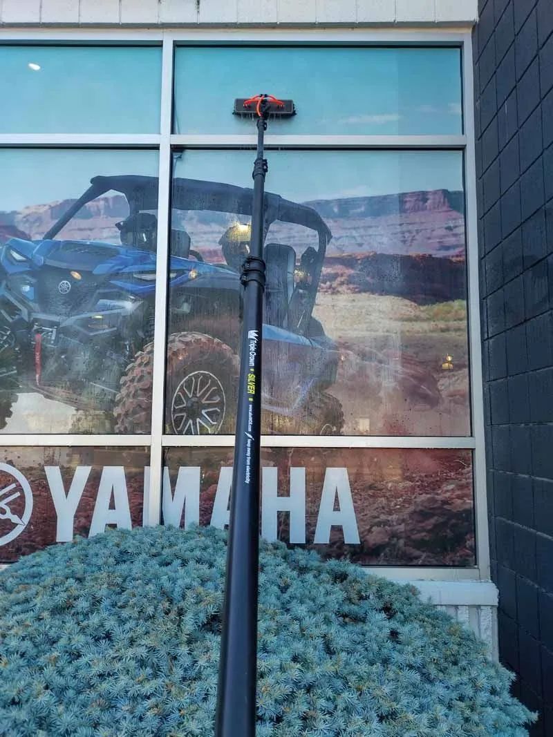 A window with a yamaha sign on it