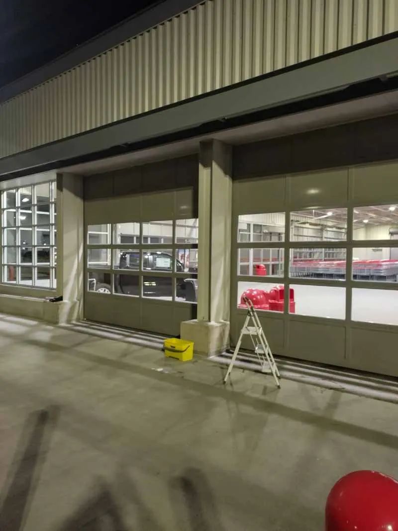 A large building with a ladder in front of it