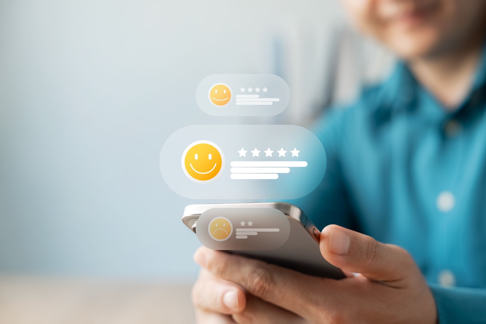 Person holding a phone, interacting with floating review icons.  Smiley faces and star ratings displayed.