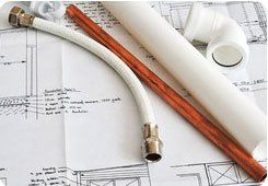 Domestic plumbing - South East London - The Considerate Plumber - plumber repairing sink pipe