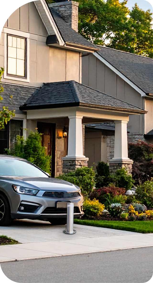 A car is parked in front of a house.