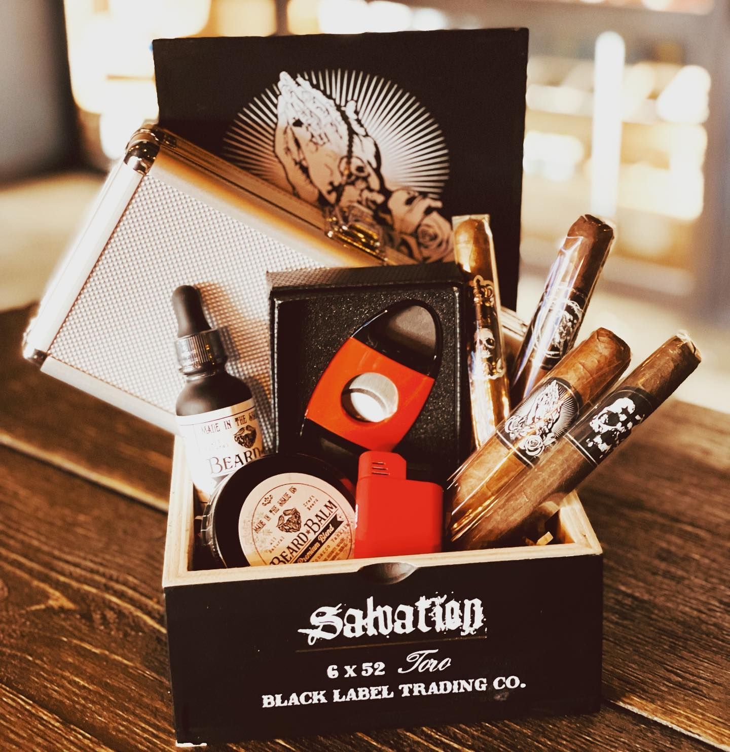 A box of salvation cigars sits on a wooden table