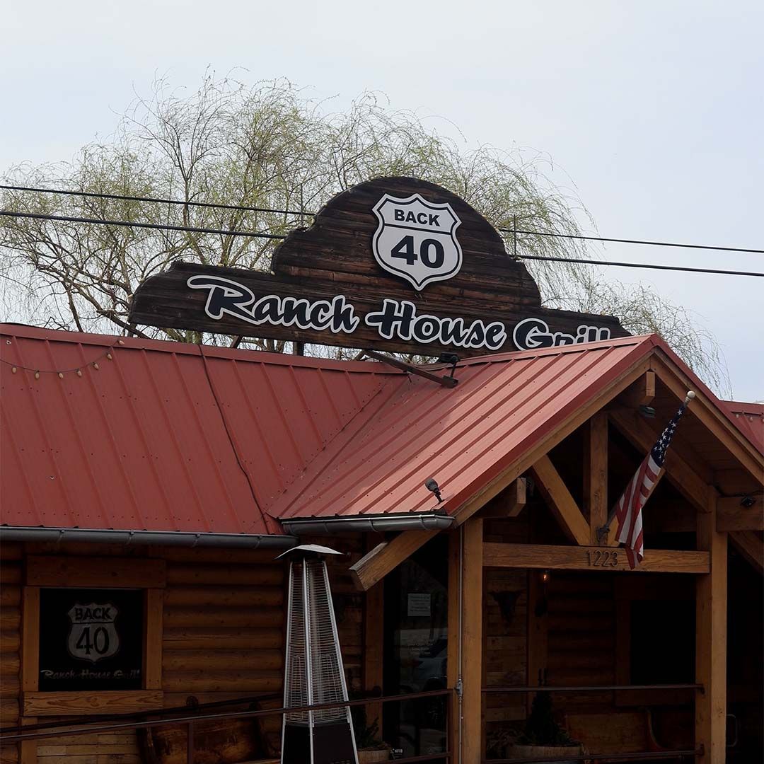 The rustic wood exterior and iconic ranch-style architecture of The Back 40 restaurant in Heber Valley, Utah.