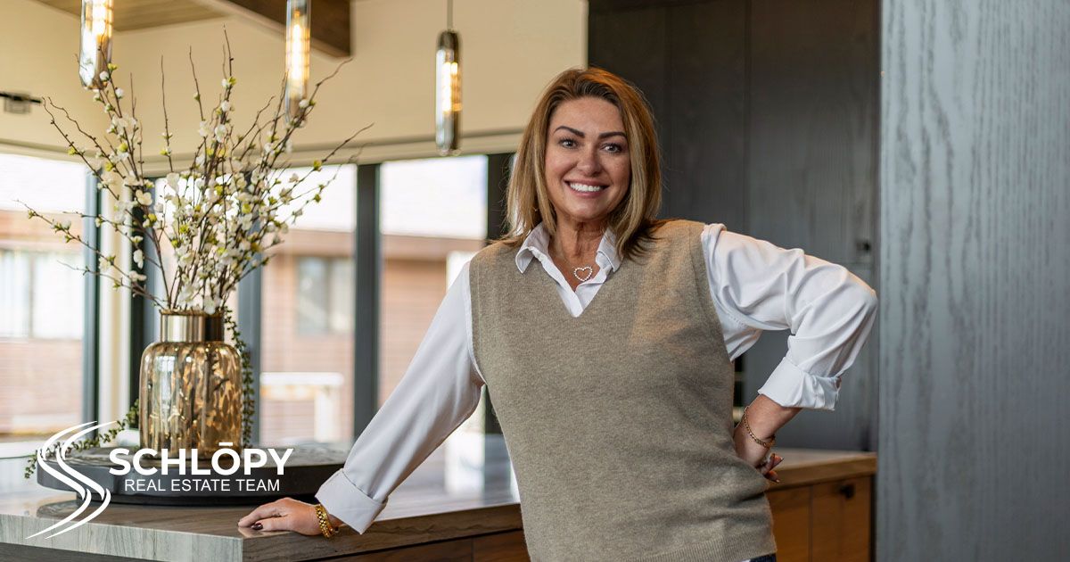 Professional headshot of Christi Gallon, Midway real estate specialist and listing agent for the Schlopy Team.