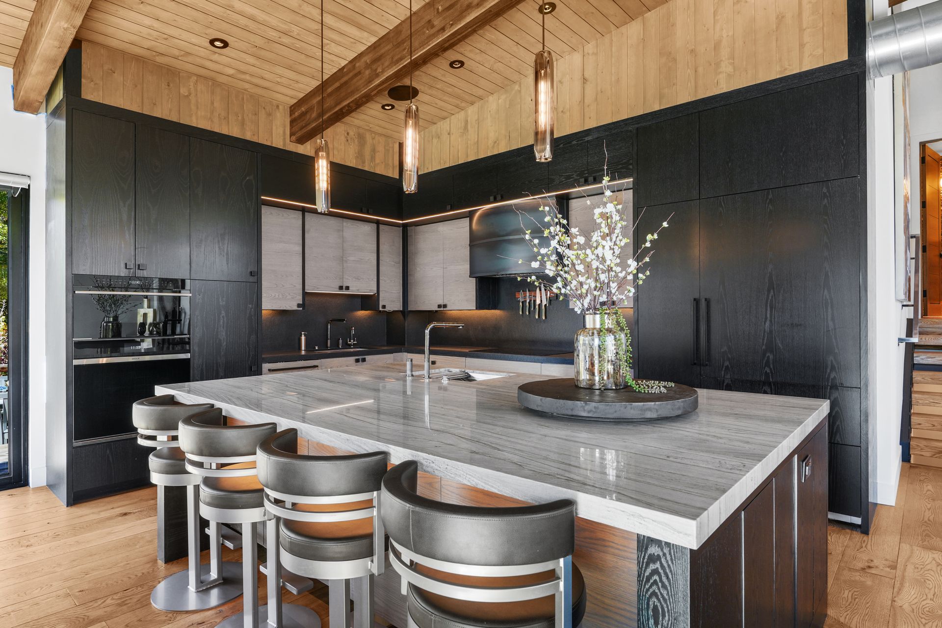 Gourmet Kitchen with Wolf Sub-Zero Appliances and Natural Stone at 3041 Oak Rim Lane