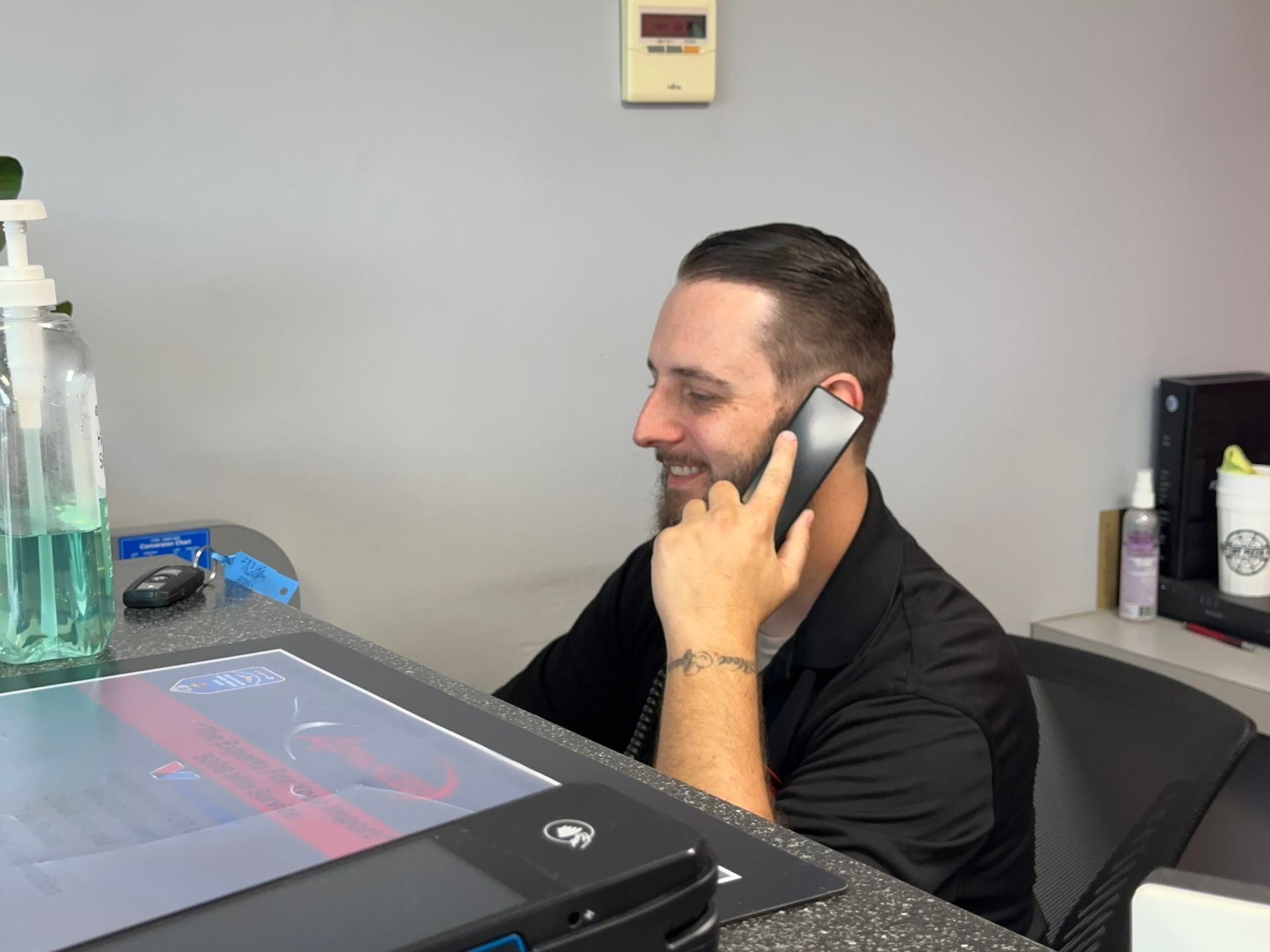A Mechanic Is Using Digital Diagnostic Tool | Advanced Car Care Center LLC