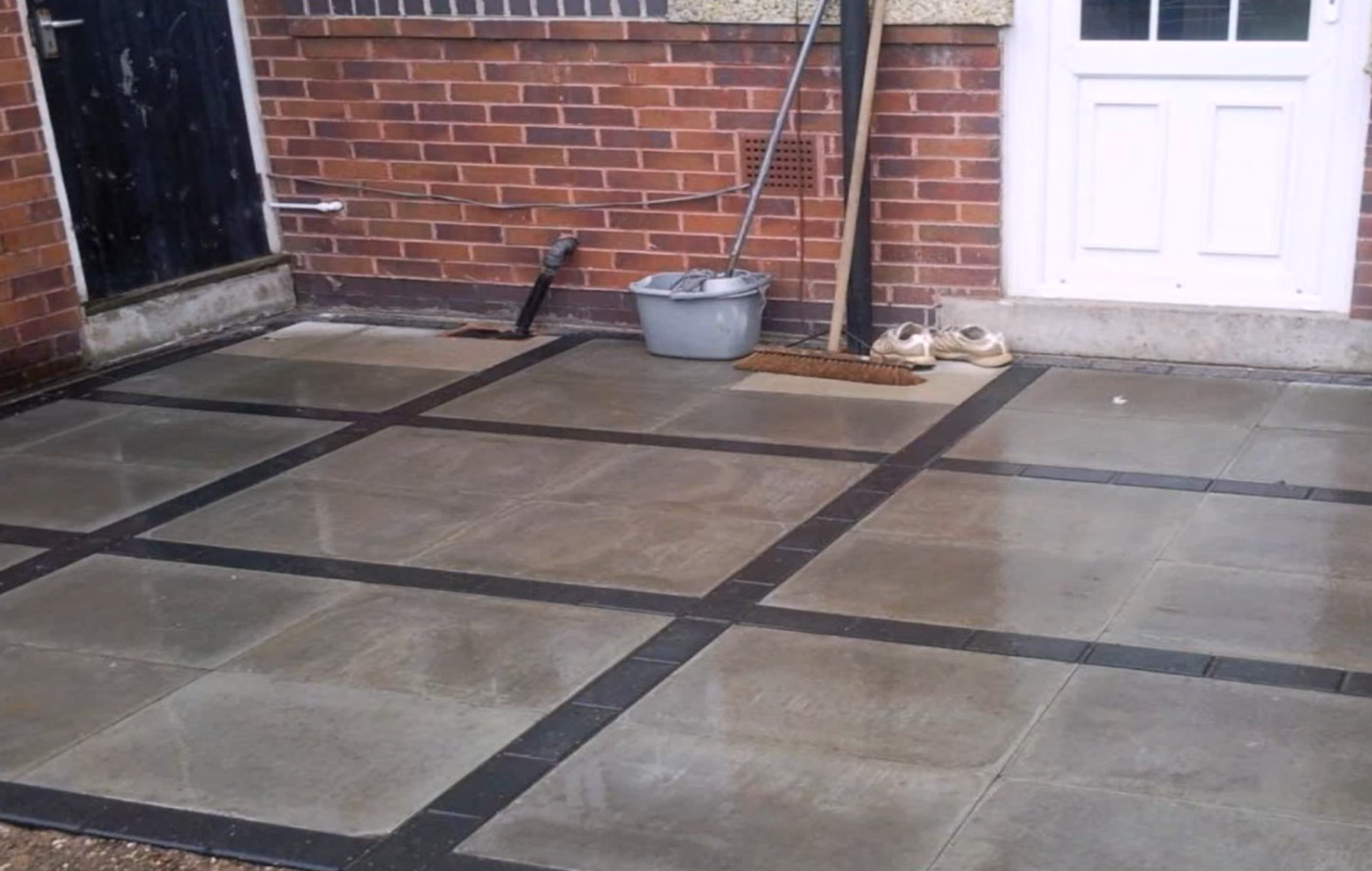 Square-patterned concrete patio