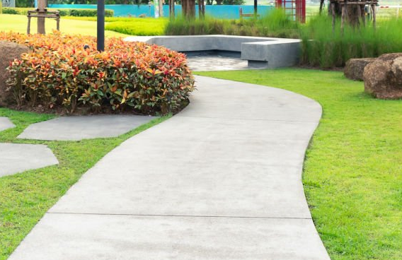 Concrete sidewalk and concrete bench