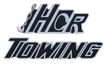 A logo for hcr towing on a white background