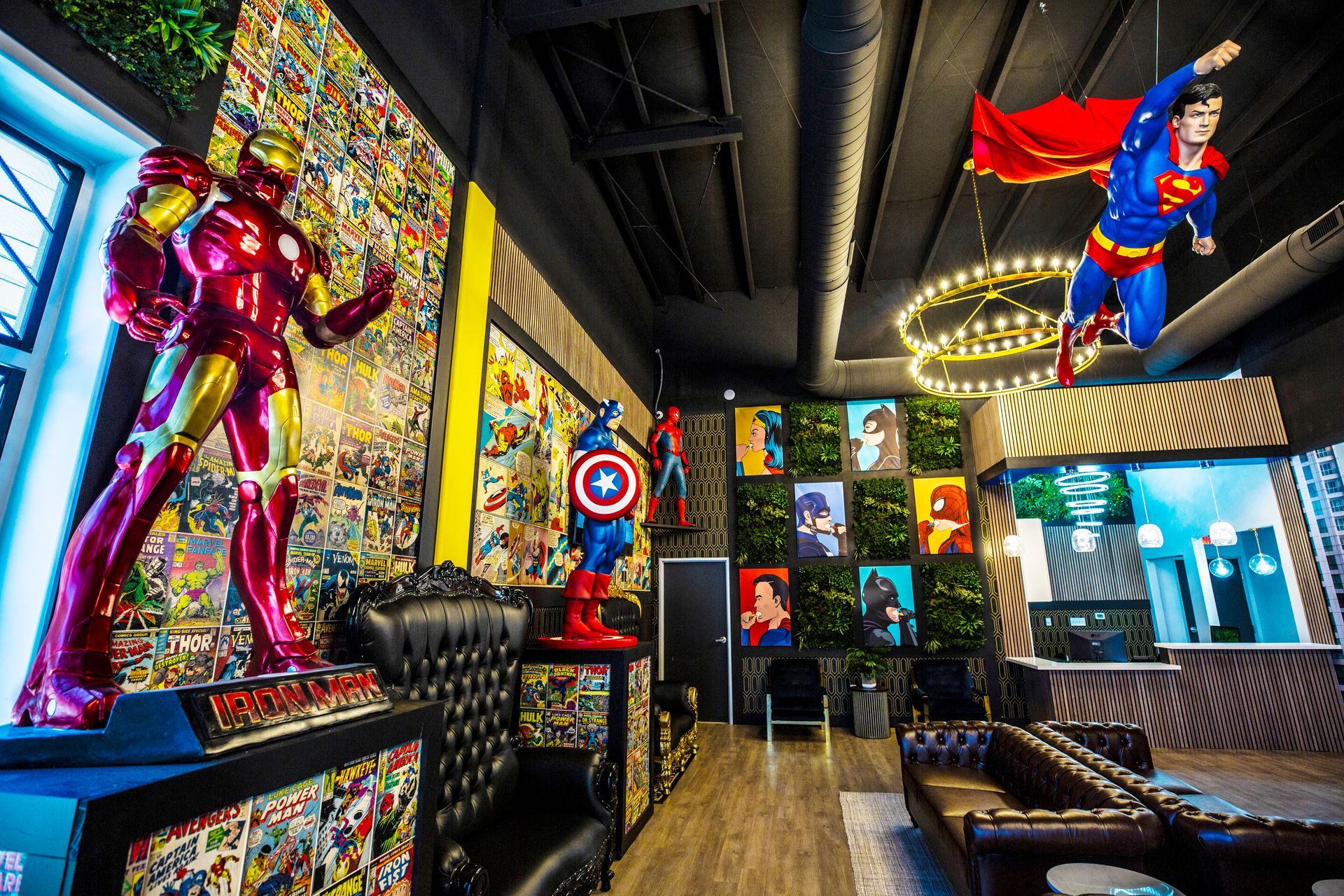 Super Dentists  in San Antonio  A room with a lot of superhero statues hanging from the ceiling.