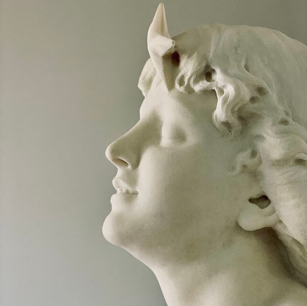 A photo of a sculpture in a museum.