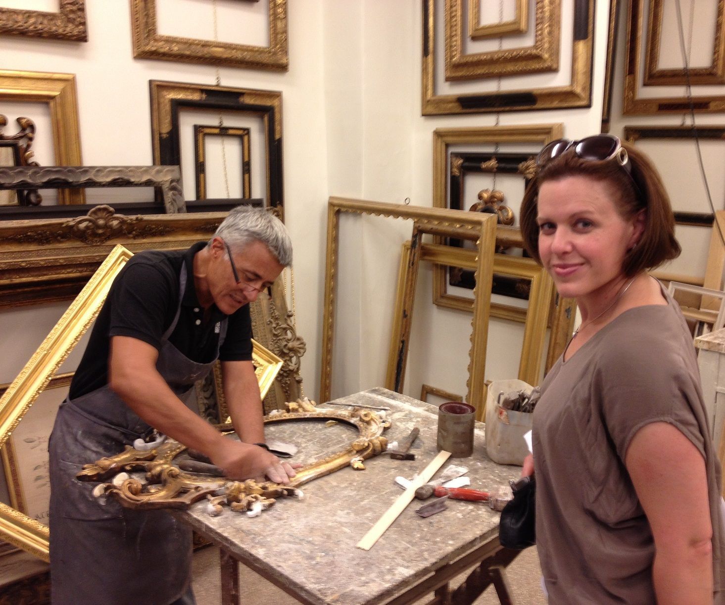 Cherylyn Russell, ARTSHOP Toowoomba's owner and Director, with art restoration expert.