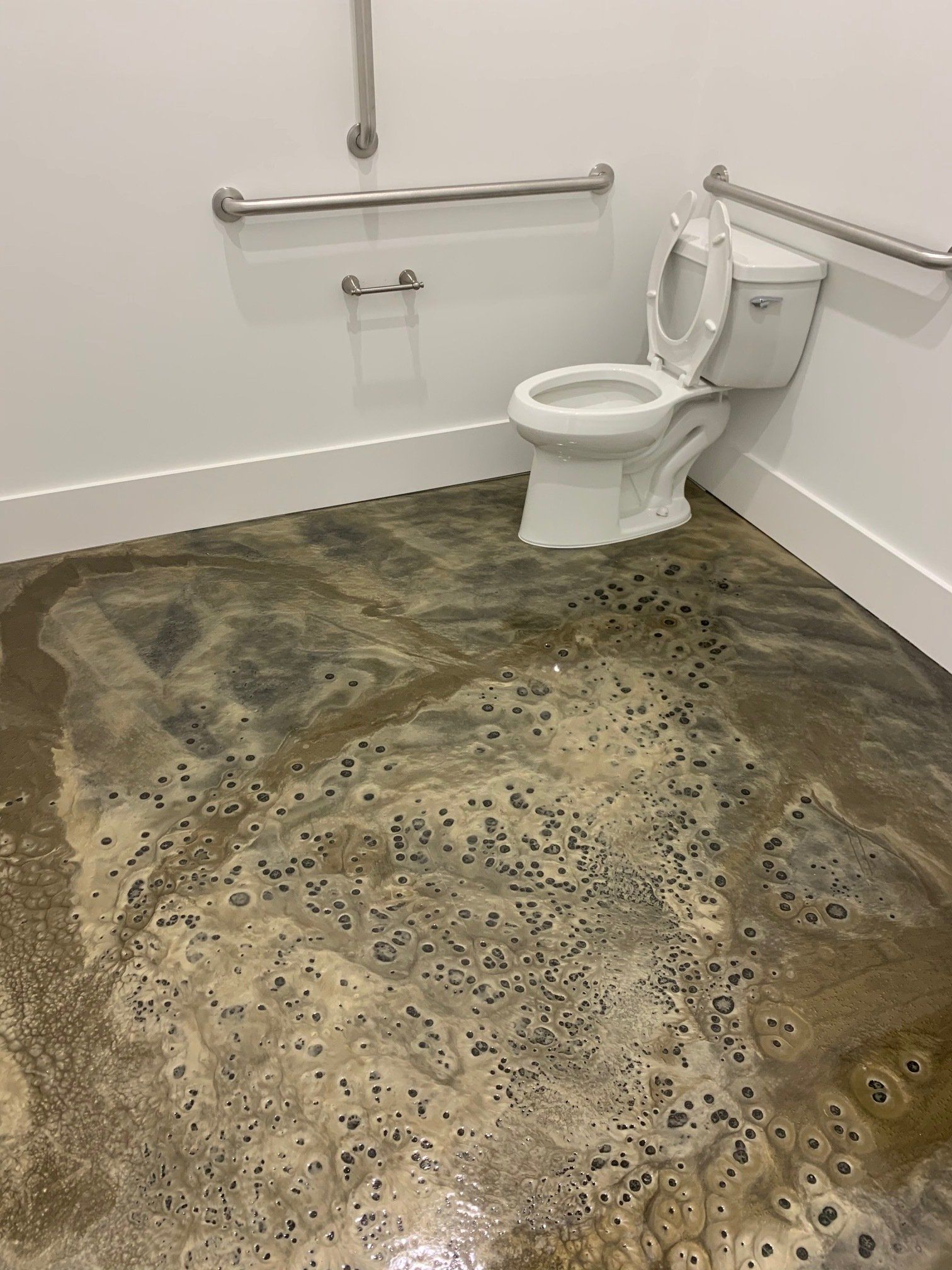 Bathroom With Epoxy Flooring — in Charleston, SC — Lowcountry Surface Coatings