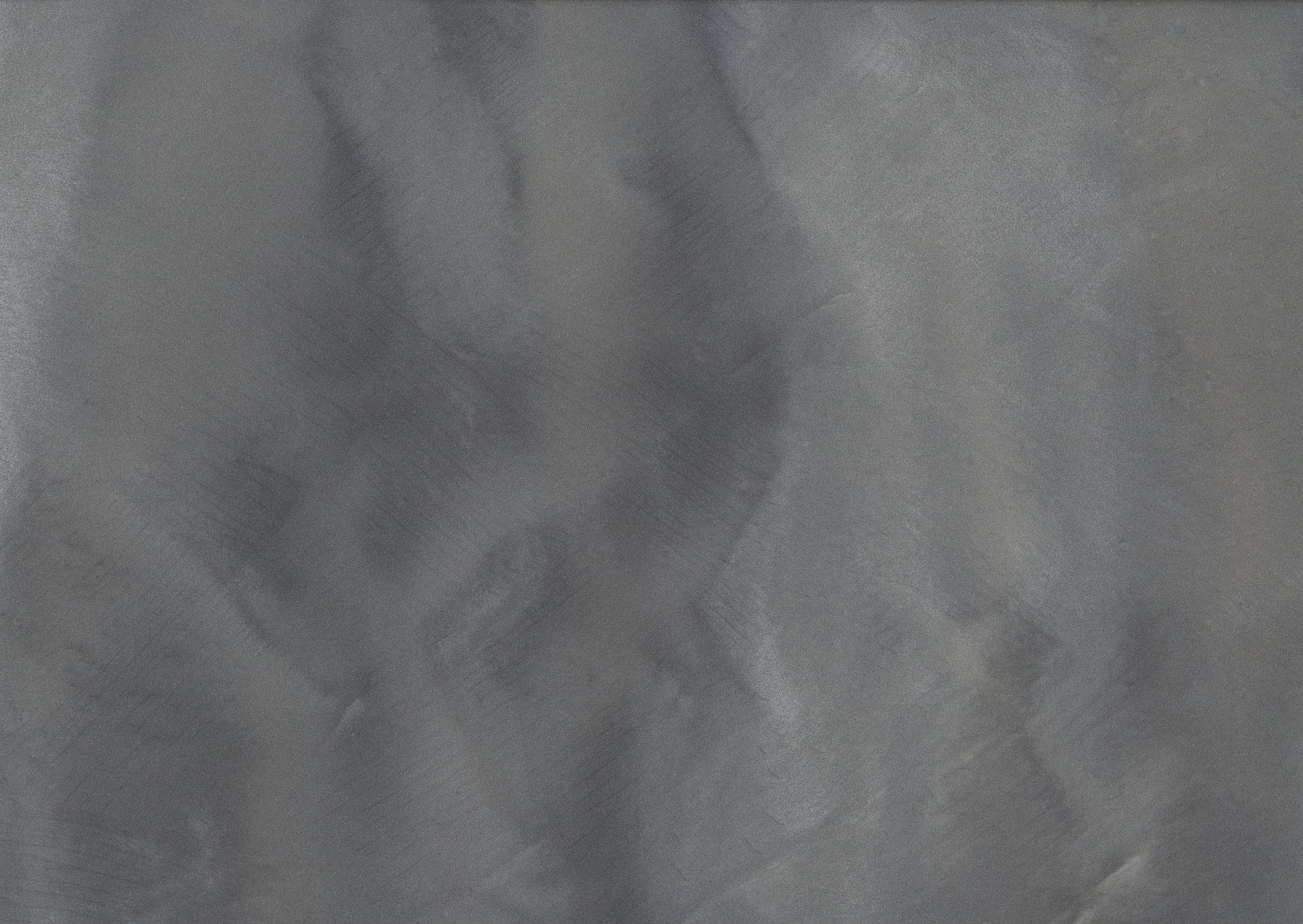 Textured, greenish-blue fabric with subtle highlights and shadows, appearing slightly rumpled or folded.