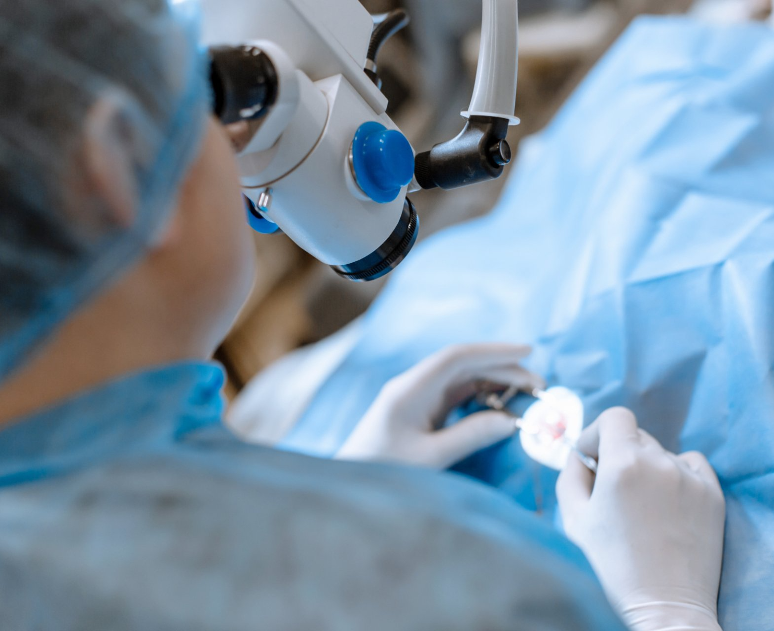 eye surgeon performing operation