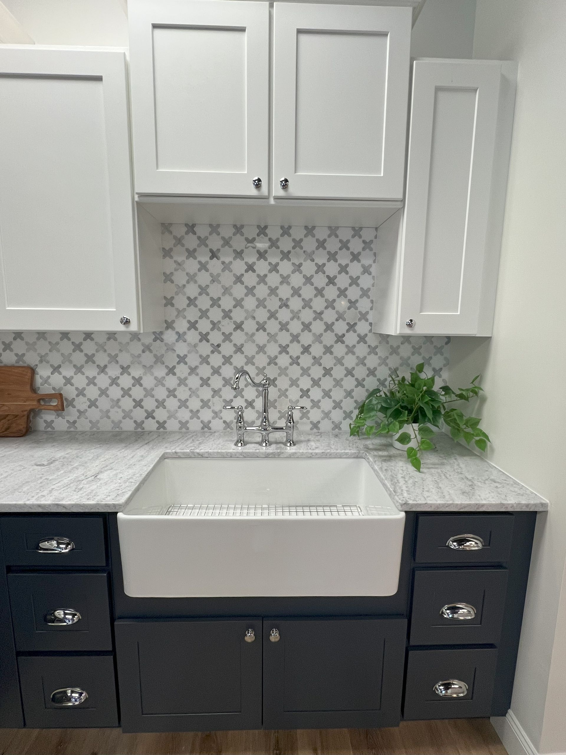 There is a large island in the middle of the kitchen.