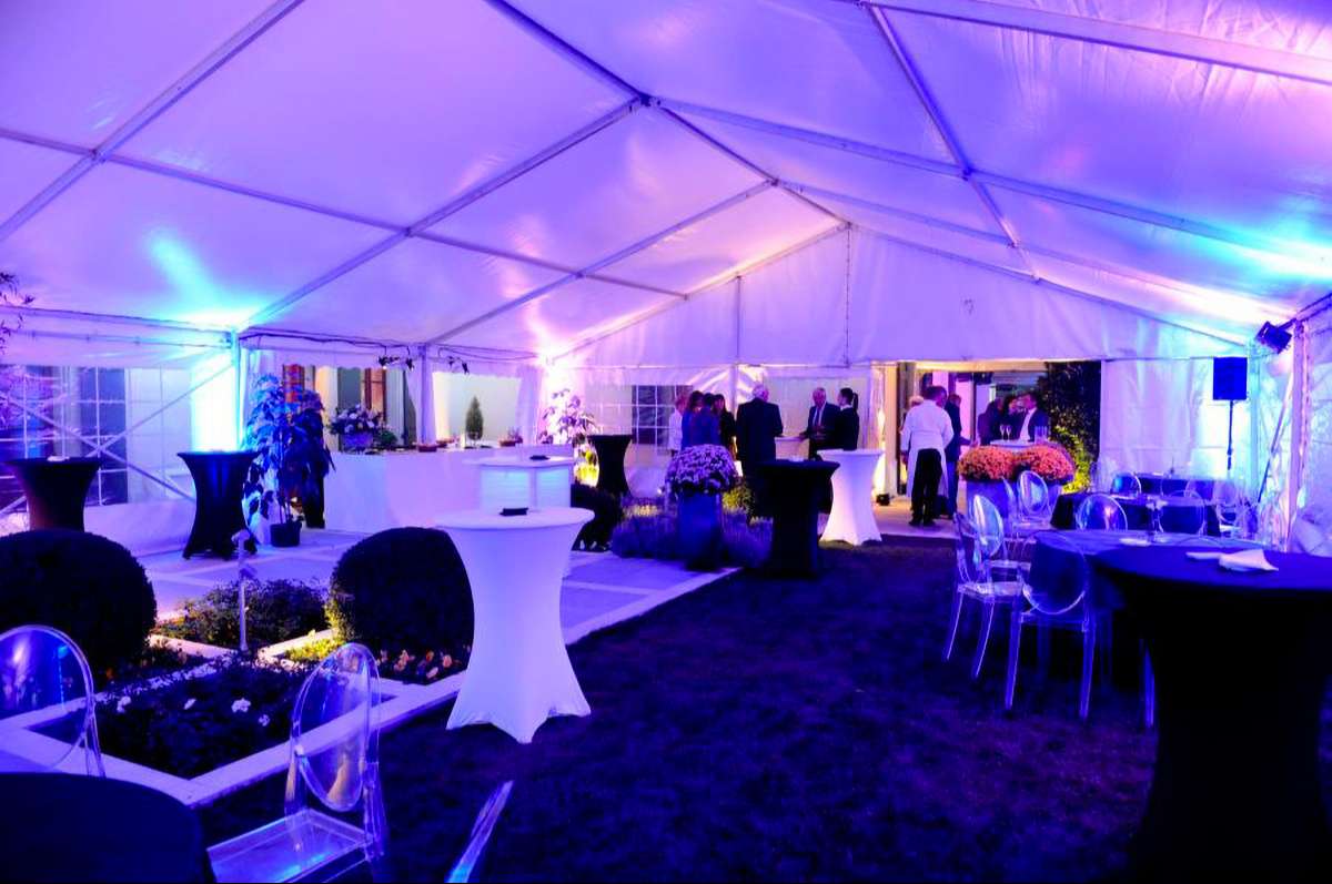 Overall view under a tent arranged for an event