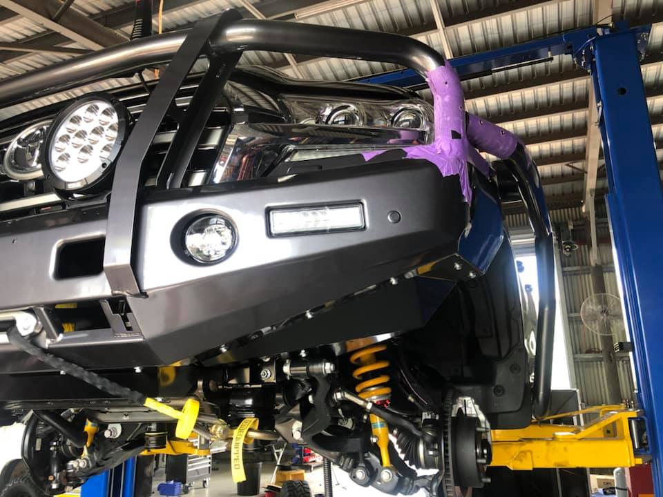 Car Driving Over Leaves in Autumn — Mechanic in Darwin, NT