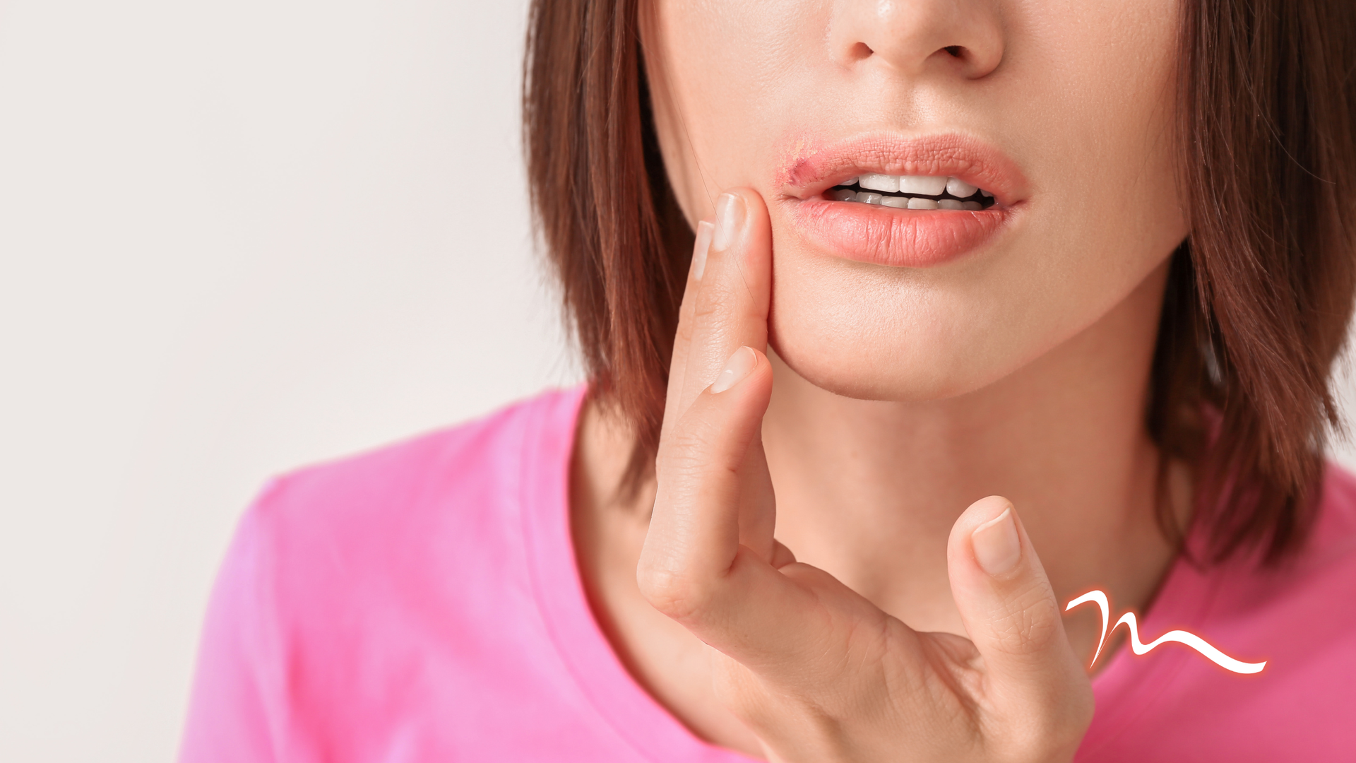 Close-up of a person touching a sore cheek, suggesting tooth or jaw pain