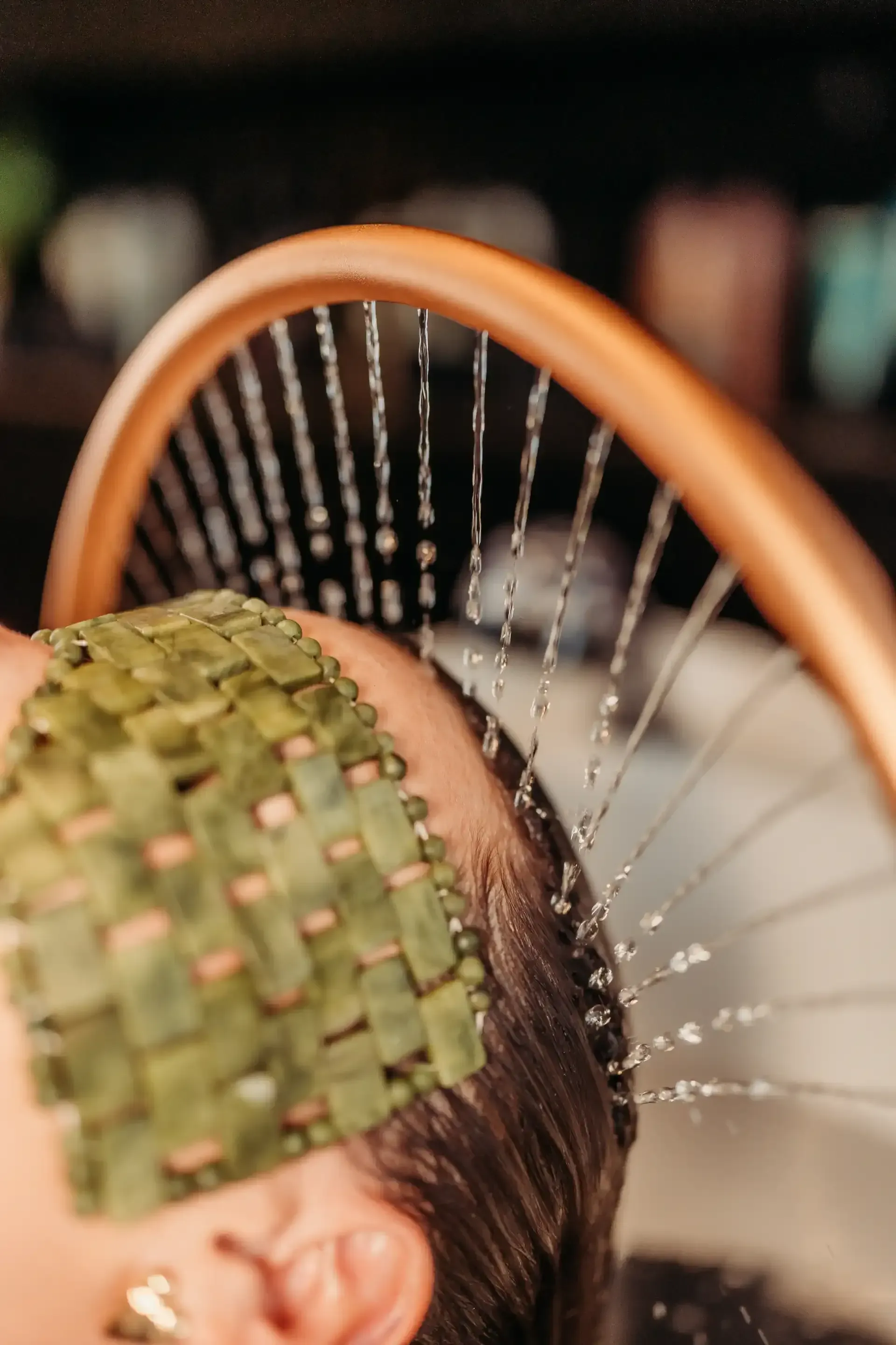 A Man is Blow Drying a Woman's Hair in a Hair Salon — Air Hair Studio in Toowoomba City, QLD