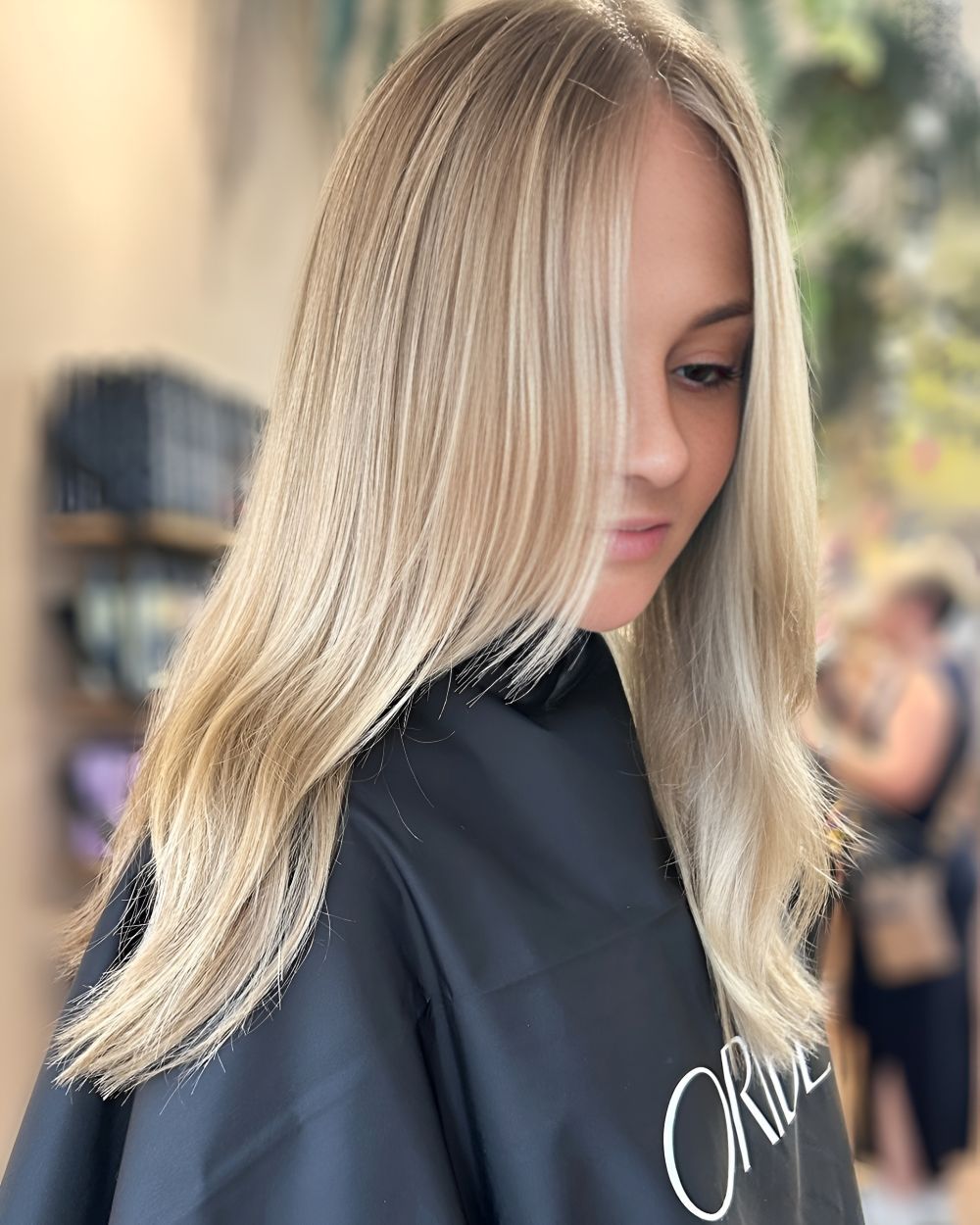 Blonde-Haired Woman with Straight-Layered Hair — Air Hair Studio in Toowoomba City, QLD