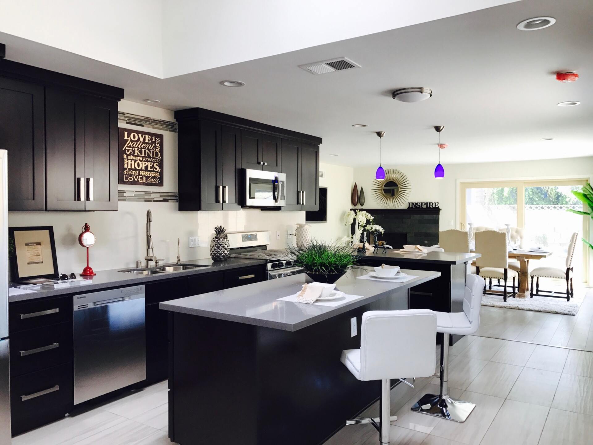 kitchen interior with white island and chairs