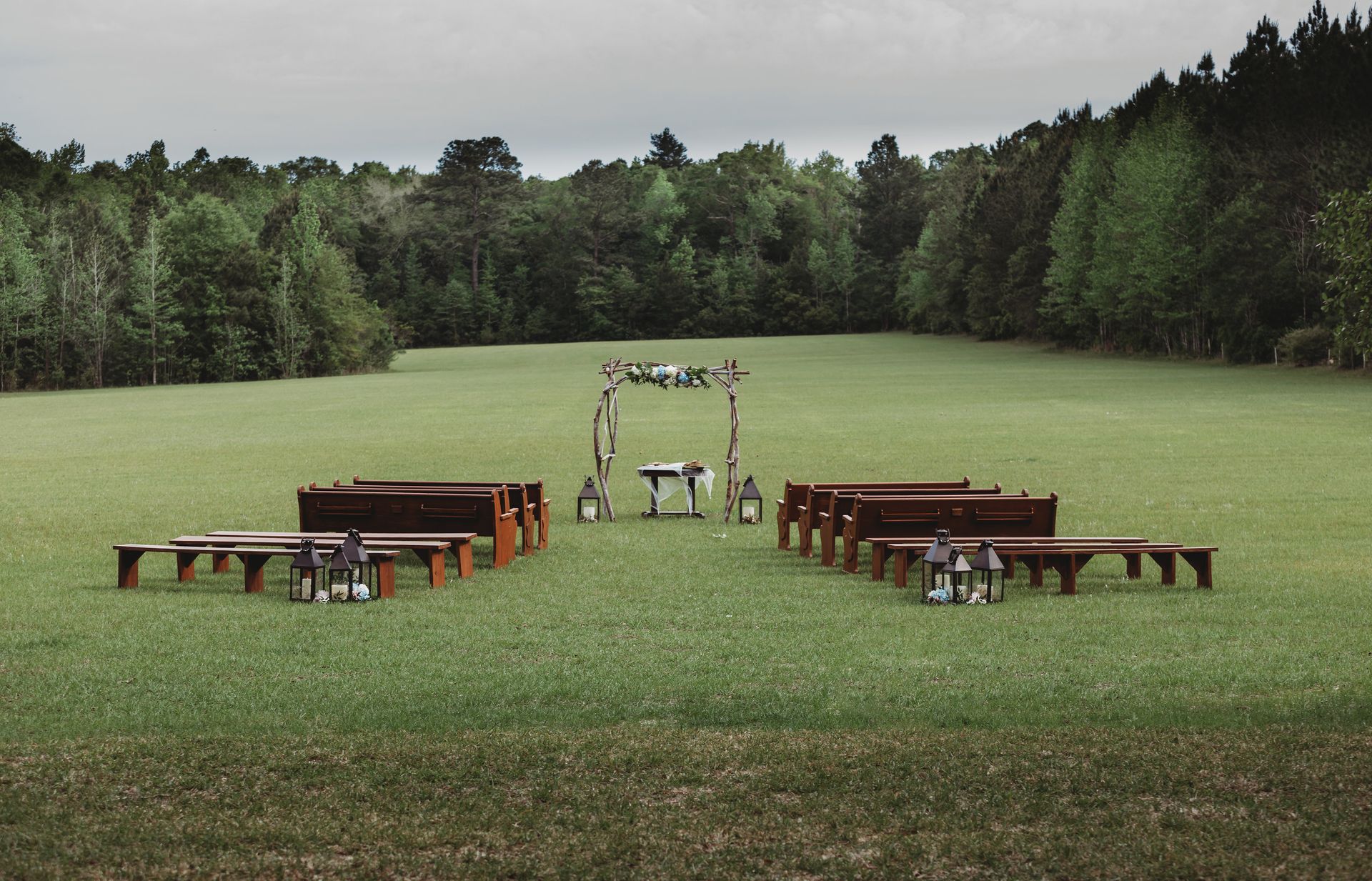 outdoor wedding ceremony in large field